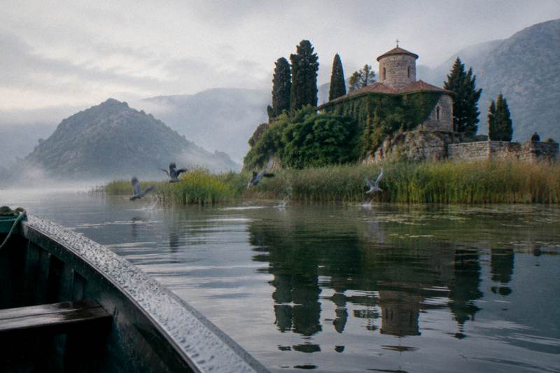 Wooden Boat to Kom Monastery