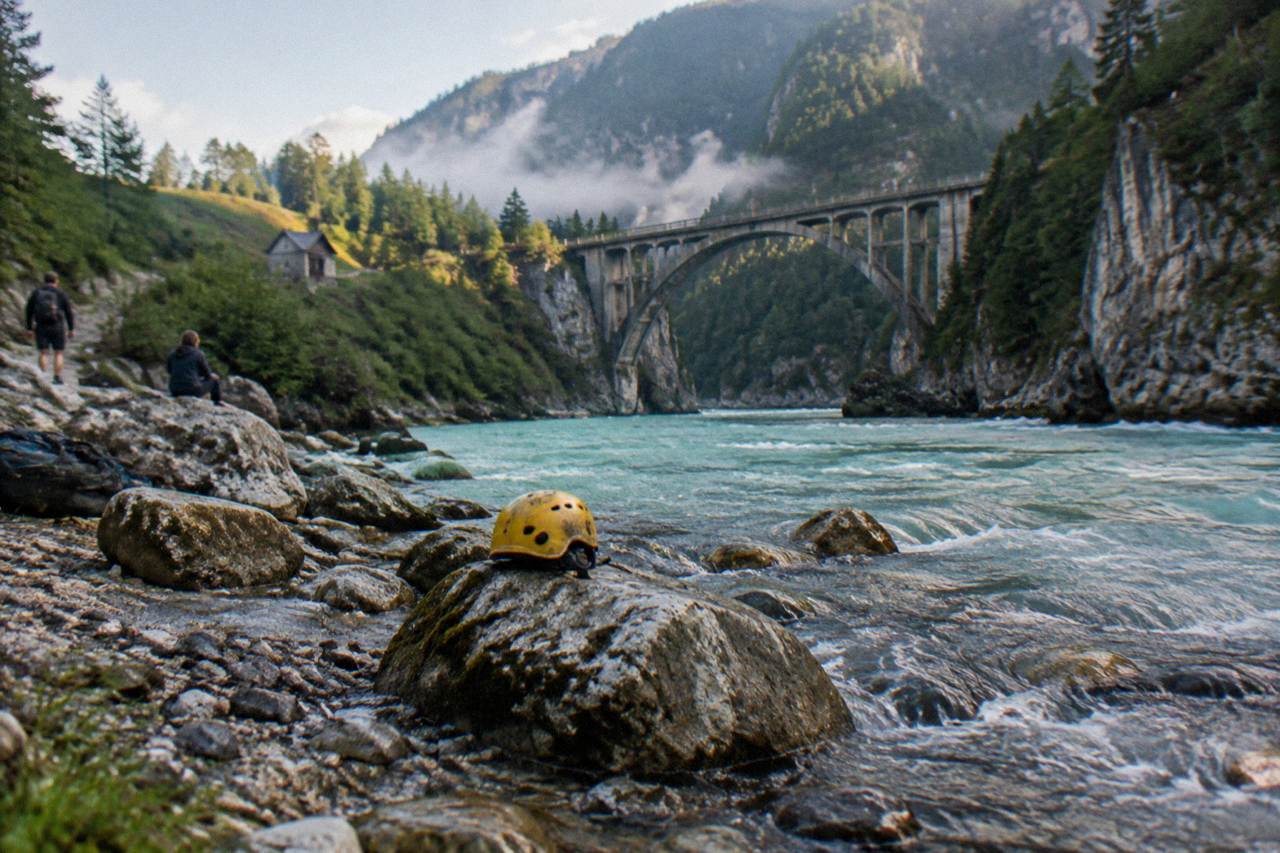 Turquoise river water flowing between steep forested canyon walls
