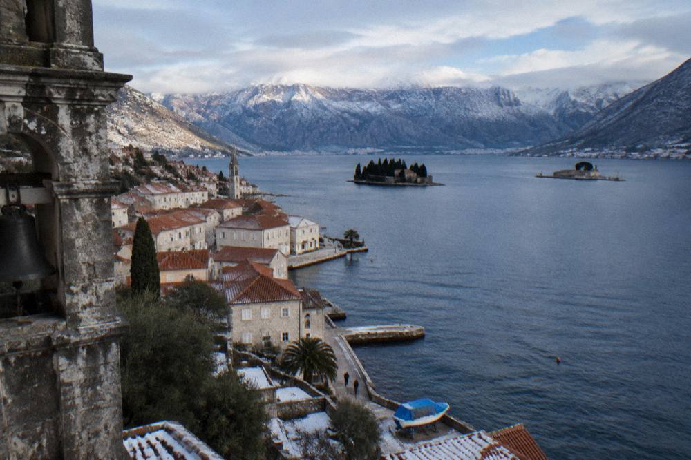 Waterfront palaces of Perast and two small islands in the bay